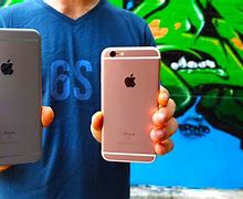 Image result for iPhone 6s Plus in Hand