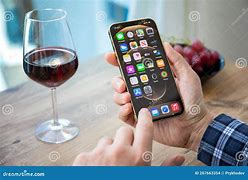 Image result for Man Hand Holding iPhone 12