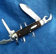 Image result for Swiss Army Knife Can Opener