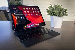 Image result for iPad Magic Keyboard with Suction Cups