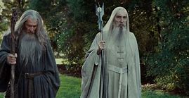 Image result for Sarumon Walkign with Gandalf