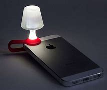 Image result for iPhone Behind Light