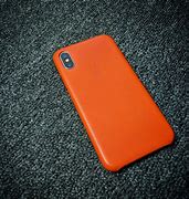 Image result for Iphone15 with Orange Leather Case India