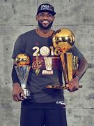 Image result for LeBron James Holding NBA Trophy