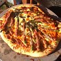 Image result for Cooking Pizza On a Magma Grill