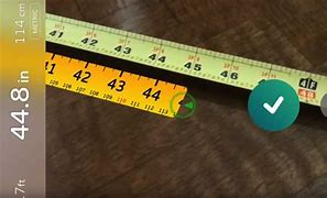 Image result for Tape-Measure Next to iPhone 13 Pro Max