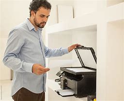 Image result for Guy Using Printer