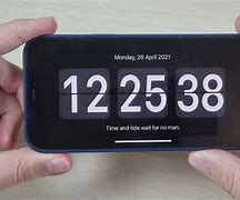 Image result for Clock On iPhone Lock Screen