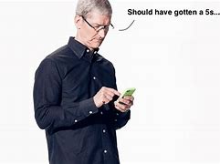 Image result for Tim Cook iPhone British Swap