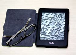 Image result for Amazon Kindle Paperwhite On Beach