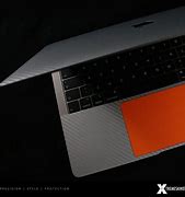 Image result for Orange MacBook