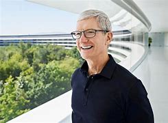 Image result for Tim Cook Shows Off iPhone