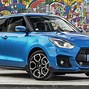 Image result for Suzuki Swift Hybrid Orange