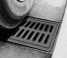 Image result for Sewer Drain Cover for Roads