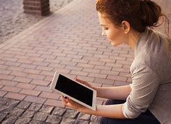 Image result for Woman Using an iPad