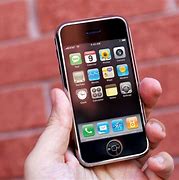 Image result for First iPhone in a Black Background