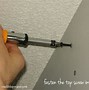 Image result for How to Install Curtain Rod Brackets