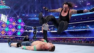 Image result for Undertaker's Chokeslamming John Cena