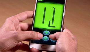 Image result for Snake Game in a Button Phone