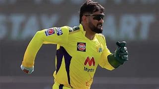 Image result for Best Bowler and Wicket Keeper in IPL in Orange Jersey