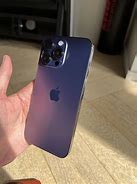 Image result for iPhone 14 Pro Max On Wooden Table