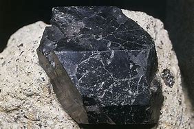 Image result for Black Crystal with White Specks