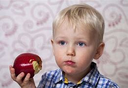 Image result for Boy Eating Red Apple