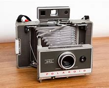 Image result for Polariod Camera On the Ground