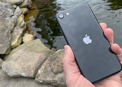 Image result for iPhone Se2022 Black in Hand Show