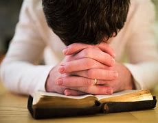 Image result for Someone Praying with a Bible