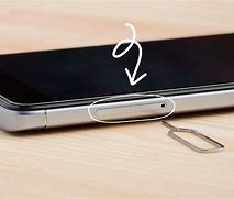 Image result for How to Take Sim Card Out of iPhone 10