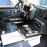 Image result for Car with Record Player in Dash