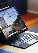 Image result for Apple iPad and Magic Keyboard