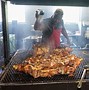 Image result for Howard Conyers Whole Hog BBQ Pit