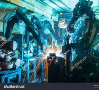 Image result for robot welder machine