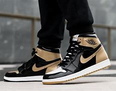 Image result for Gold and Black Air Jordan Shoes
