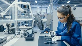 Image result for Factory Robots Image with Female Engineer