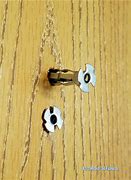 Image result for Attaching Coat Hooks to Hollow Door