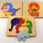 Image result for Wooden Puzzles Educational Toys