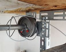 Image result for Cables alongside Garage Doors Are Loose