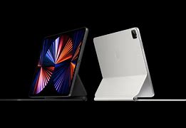 Image result for Space Gray iPad Pro with White Magic Keyboard