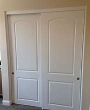 Image result for Black Bypass Closet Doors