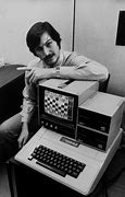 Image result for Steve Jobs Holding an Apple