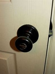 Image result for Oiled Bronze Bathroom Door Knobs with Privacy Lock