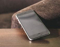 Image result for Image of Apple iPhone On Table