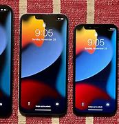 Image result for iPhone 13 Mini in Comparisn with iPhone 14 Size
