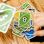 Image result for Guy Holding UNO Deck