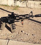 Image result for AR-15 with Suppressor