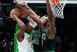 Image result for Donovan Mitchell Dunking Cavs