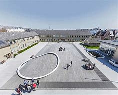 BIG breidt school uit in continue beweging - architectenweb.nl